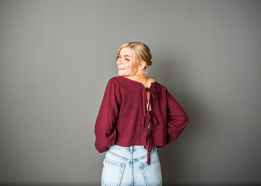 Cropped burgundy linen shirt with tie closure and open back